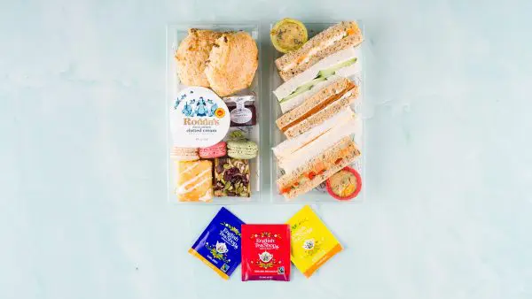 vegetarian afternoon tea box with sandwiches and artisanal cakes