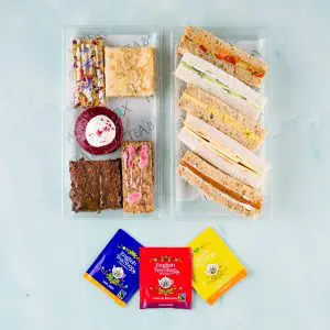 Vegan afternoon tea box with sandwiches and artisanal cakes